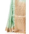 MINT GREEN BODY LINEN BANARASI WITH ALL OVER ZARI BUTA, CONTRAST BORDER, AND CONTRAST BLOUSE PIECE