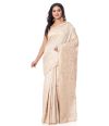 BEIGE TUSSAR SAREE WITH CUTWORK AND ALLOVER SELF THREADWORK AND MATCHING BLOUSE PIEC