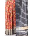 MULTI COLOURED FLORAL PRINT ON BRICK RED GHICHHA TUSSAR WITH CONTRAST BORDER & BLOUSE PIECE