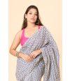 printed cotton saree with a classic white base & delicate blue floral motifs