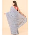 printed cotton saree with a classic white base & delicate blue floral motifs