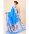 BLUE BANARASI SAREE adorned with intricate golden embroidery, delicate motifs & MATCHING BLOUSE PIECE