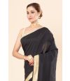 sleek design BLACK COTTON SILK ADORNED by stunning golden border with intricate patterns