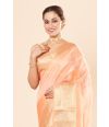 soft, luxurious peach saree with delicate golden zari detailing and MATCHING BLOUSE PIECE