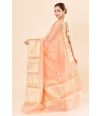 soft, luxurious peach saree with delicate golden zari detailing and MATCHING BLOUSE PIECE