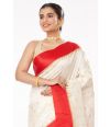 QUINTESSENTIAL OFF WHITE BODY, RED BORDER GARAD, ALL OVER ZARI BUTA WITH GORGEOUS RED COTTON SILK ROUND NECK, BACKLESS BLOUSE (PADDED)