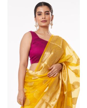 YELLOW SOFT ORGANZA BANARASI GOLDEN ZARI BUTA, GOLDEN BORDER TEAMED WITH PURPLE SOFT COTTON BLEND SELF WORK BLOUSE