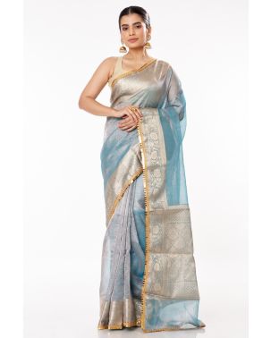 METALLIC BLUE TISSUE BENARASI WITH FINE LACE PAIRED WITH MATTE GOLD COTTON SILK PARTY WEAR BLOUSE (PADDED)