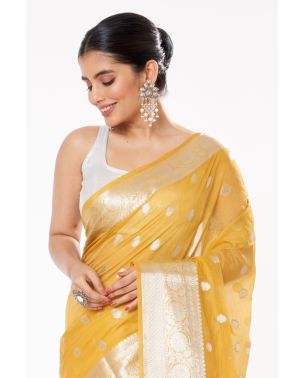 YELLOW SOFT ORGANZA, ALL OVER SILVER ZARI WORK PALLU WITH SHIMMERY SILVER PARTY WEAR COTTON SILK BLOUSE (PADDED)